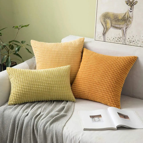 Ribbed corduroy cushion covers on a sofa